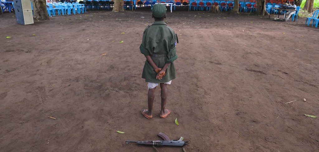 A child stands during a ceremony to release children from the ranks of armed groups and start a process of reintegration in Yambio, South Sudan.